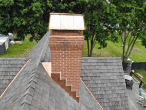 Chimney with copper roof flashing