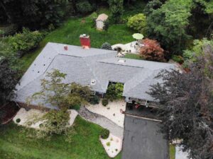 Aerial view of gray GAF asphalt shingles on home in New Hempstead, NY