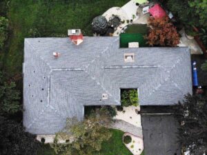 Aerial view of gray GAF asphalt shingles on home 