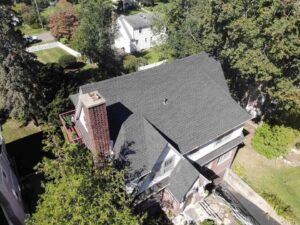 aerial view of home with asphalt shingle replacement
