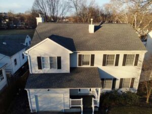 front view of white home with gray GAF asphalt shingles in Stamford, CT