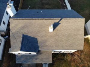 Aerial view of white home with gray GAF asphalt shingles in Stamford, CT