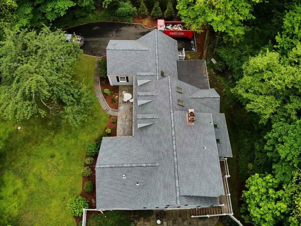 Overhead view of home with asphalt roof in Darien, CT