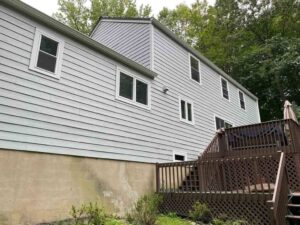 Rear of home with Harvey windows replacement on home in Cos Cob