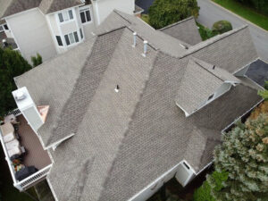 Aerial view of gray GAF asphalt shingles on home