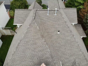 Aerial view of section of roof with gray GAF asphalt shingles