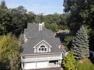 Aerial view of side of home with GAF asphalt shingle replacement