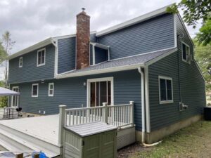 Back of home with new roof and siding in Stamford, CT