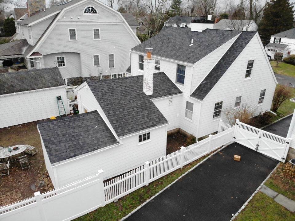 Aerial view of white James Hardie siding on home