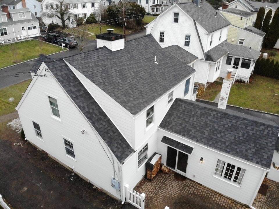 Aerial view of white James Hardie siding on home