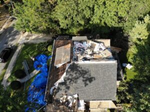 Aerial view of roof removal in progress