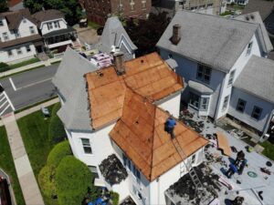 Aerial view of roof removal in progress