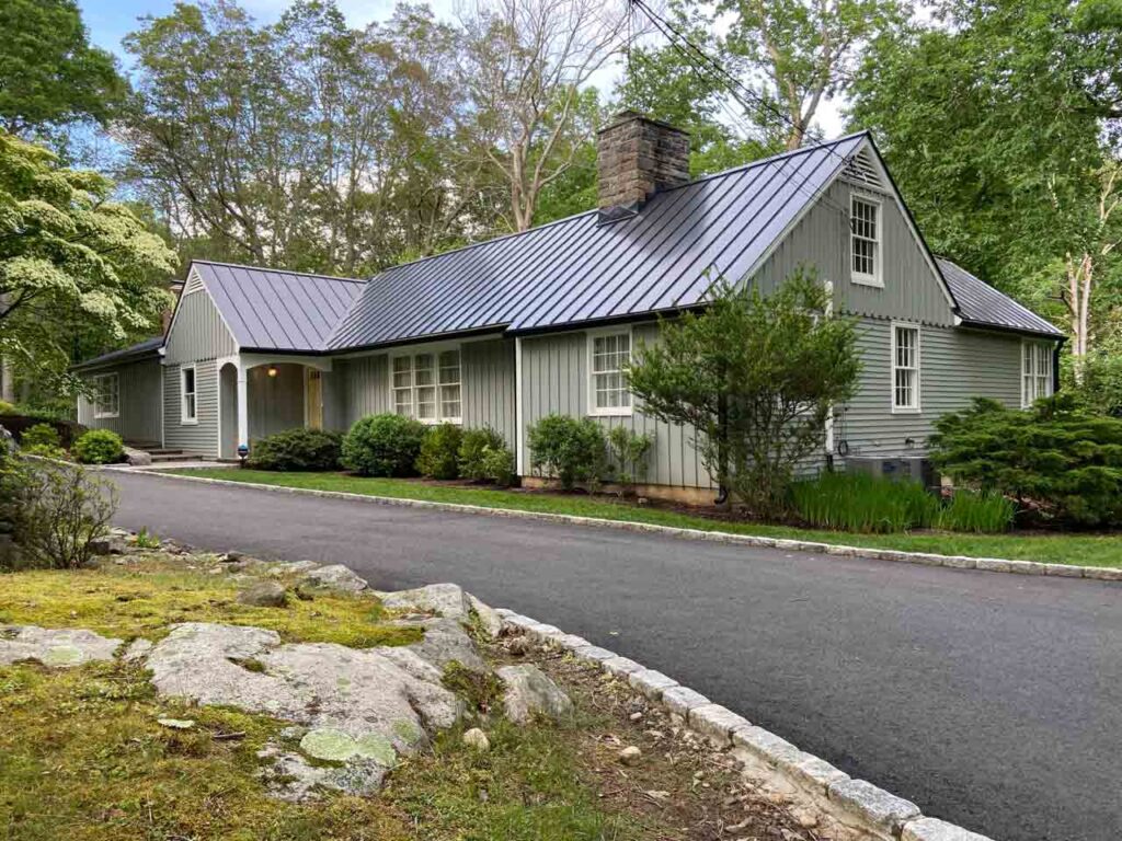 Gray home with metal roof