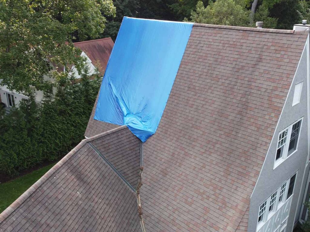 blue tarp covering roof