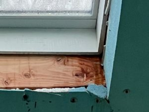 Window ledge with damaged wall