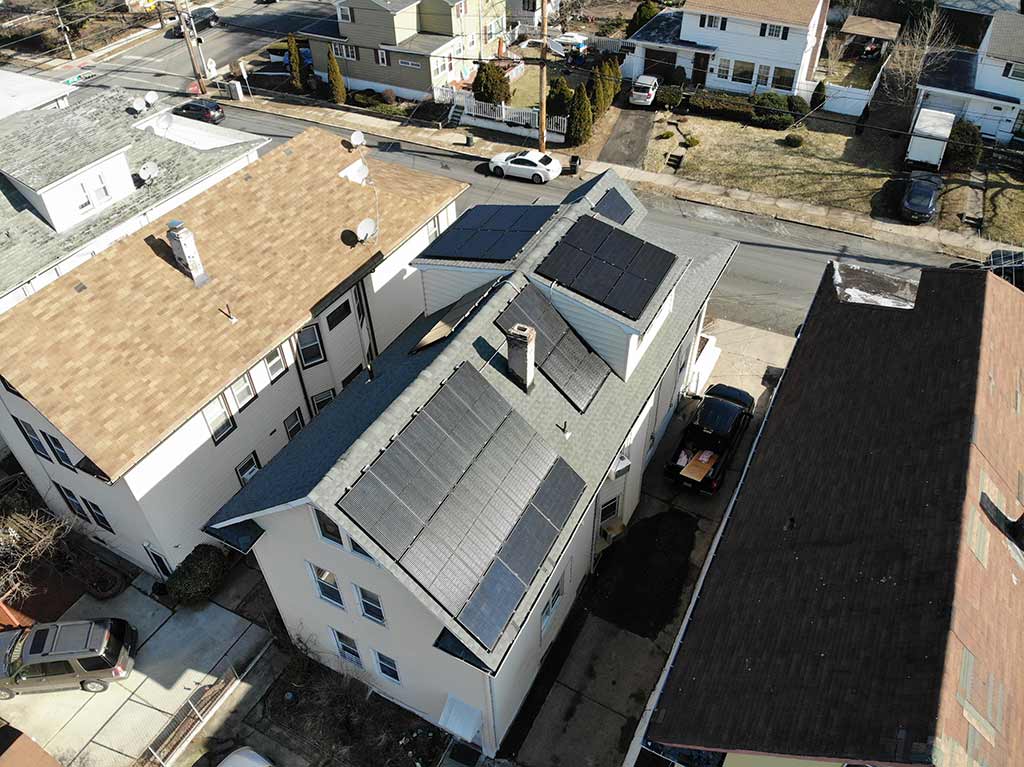 aerial view of home with solar shingles