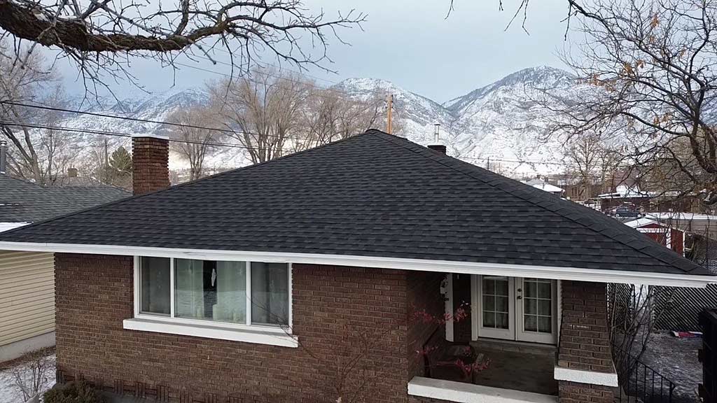 front view of new roof in provo utah with mountain in back