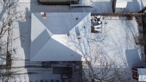 old roof covered in snow in provo utah